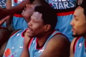 那年奥尼尔坐如喽喽 突然被双手抱头 环顾四周发现是神的关照